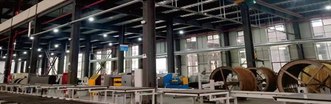 Long production hall with hose reels